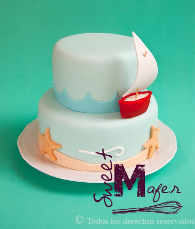 Torta con paisaje marino y barquito de sweet mafer