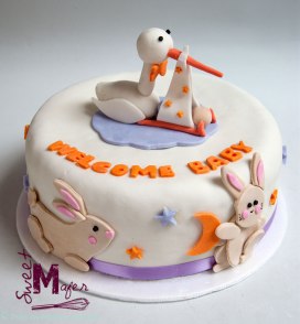 Torta baby shower cigüeña y conejos